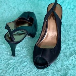 Gently worn black satin heel
